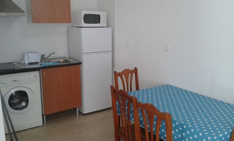 Comfort Apartment, 1 Bedroom, Pool View | Private kitchenette | Fridge, microwave, stovetop, toaster