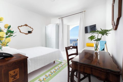 Standard Double Room, Balcony, Sea View | Minibar, in-room safe, individually furnished, desk