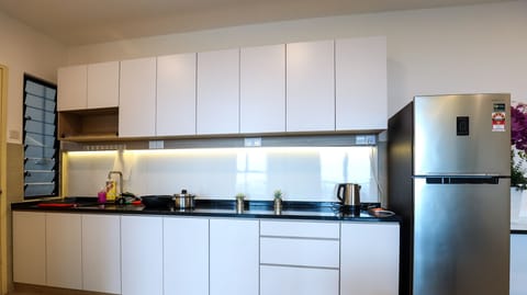 Design Apartment, 2 Bedrooms | Private kitchenette | Fridge, microwave, cookware/dishes/utensils, cleaning supplies