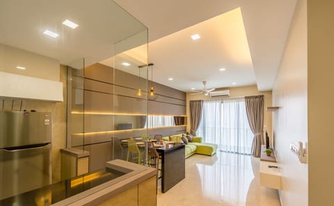 Executive Apartment, 3 Bedrooms | Living room | 50-inch flat-screen TV with digital channels, TV, Netflix