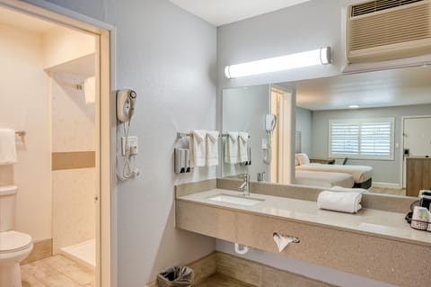 Standard Room, 2 Queen Beds | Bathroom | Free toiletries, hair dryer, towels, soap