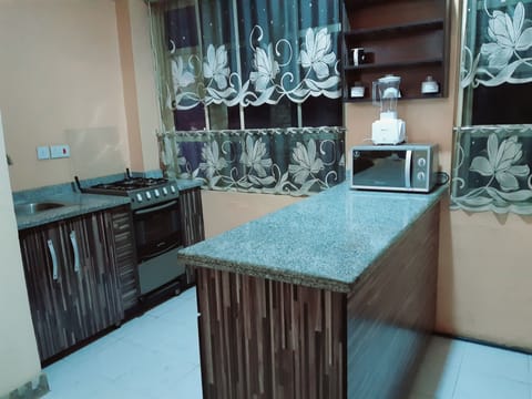 Family Chalet, 4 Bedrooms | Private kitchen | Microwave, cookware/dishes/utensils