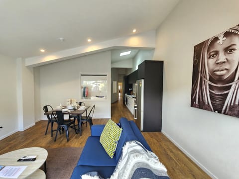 Deluxe Apartment, 2 Bedrooms | Living area | 50-inch flat-screen TV with cable channels, Smart TV, Netflix