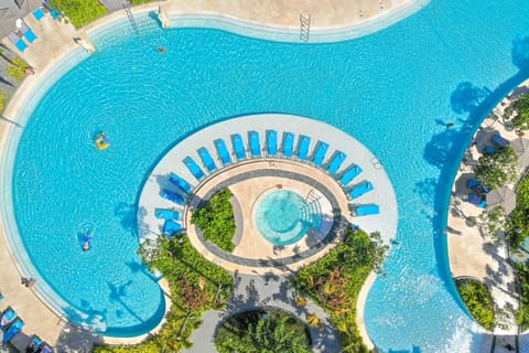 5 outdoor pools, open 8:00 AM to 7:00 PM, pool umbrellas, sun loungers