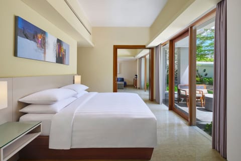 Suite, 1 King Bed, Non Smoking, Pool View | Minibar, in-room safe, individually decorated, individually furnished