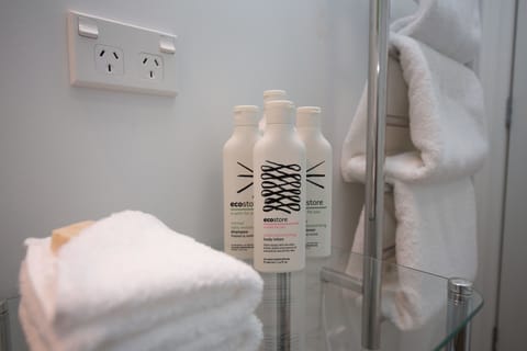 The Owner's Cottage | Bathroom amenities | Shower, rainfall showerhead, designer toiletries, hair dryer