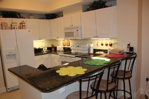 Condo, 2 Bedrooms, Balcony, Beach View (704) | Private kitchen | Full-size fridge, microwave, oven, stovetop