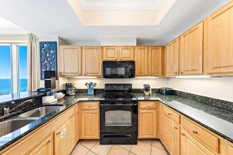 Condo, 2 Bedrooms, Balcony, Beach View (1509) | Private kitchen | Full-size fridge, microwave, oven, stovetop