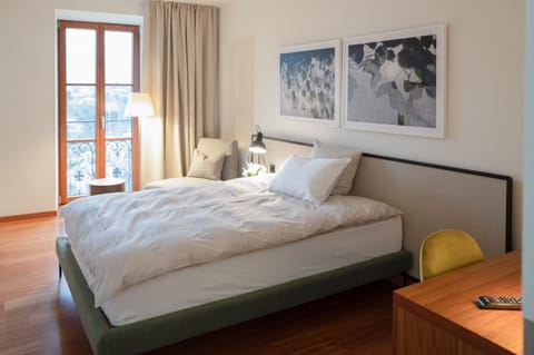 Single Room | Minibar, in-room safe, desk, iron/ironing board