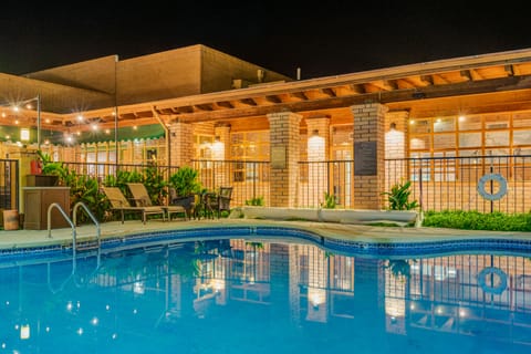 Outdoor pool, a heated pool, sun loungers