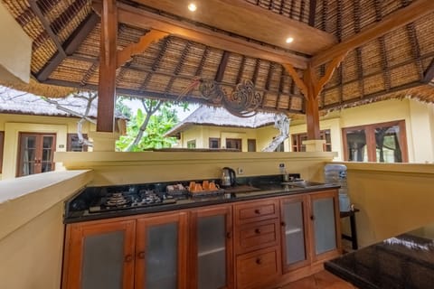 Widuri Garden View Family Villa No.12 | Private kitchen | Fridge, coffee/tea maker, electric kettle