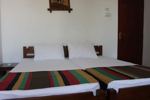 Standard Triple Room, 3 Twin Beds, Non Smoking, Mountain View | Individually furnished, free WiFi, bed sheets