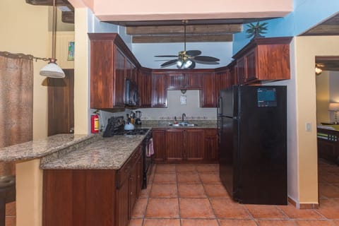 Condo, 2 Bedrooms | Private kitchen | Fridge, microwave, oven, coffee/tea maker