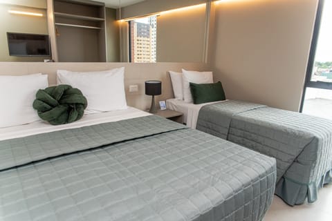 Triple Room | Minibar, in-room safe, laptop workspace, free WiFi