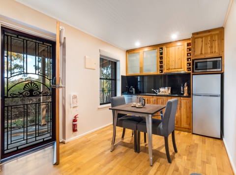 Superior Suite, 1 Bedroom, Lake View | Private kitchen | Full-size fridge, microwave, stovetop, dishwasher