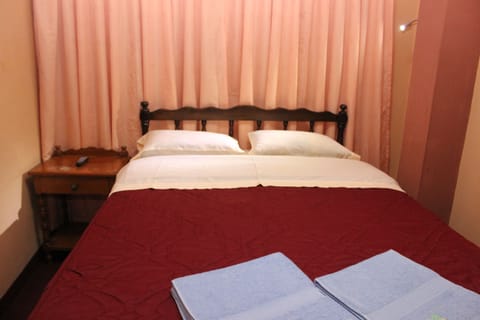 Basic Double Room, 1 Bedroom, City View | Down comforters, in-room safe, individually decorated, free WiFi