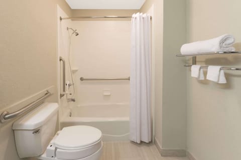 Room, 2 Queen Beds, Smoking | Bathroom | Combined shower/tub, hydromassage showerhead, hair dryer, towels