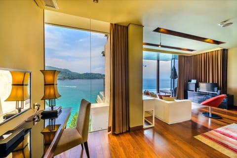 Impiana Private Villa | Living area | 42-inch LCD TV with cable channels, TV, DVD player