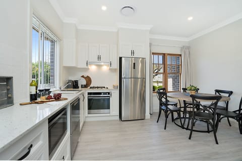 Executive House | Private kitchen | Full-size fridge, microwave, oven, stovetop