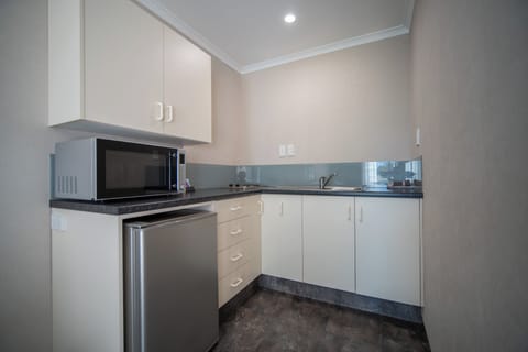 Apartment, 1 Bedroom | Private kitchen | Fridge, microwave, coffee/tea maker