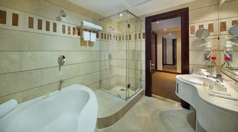 Suite, 2 Bedrooms (Seasons) | Bathroom | Combined shower/tub, deep soaking tub, free toiletries, hair dryer