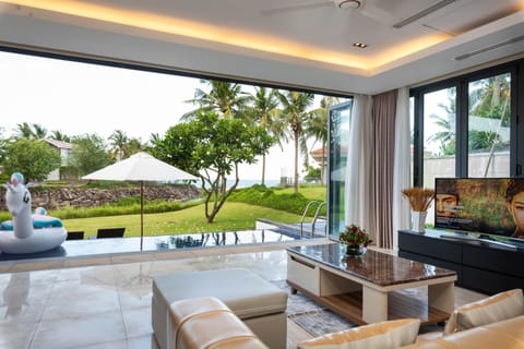 Villa Suite 4 Bedrooms with Pool | Living area | 40-inch flat-screen TV with digital channels