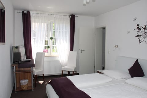 Double Room | Living area | 78-cm flat-screen TV with cable channels, TV