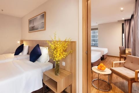 Family Quadruple Room | Minibar, in-room safe, individually decorated, individually furnished