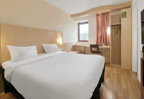 Desk, laptop workspace, blackout drapes, soundproofing