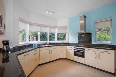 Blue Bay Beach 2 bedroom Apartment | Private kitchen | Full-size fridge, oven, stovetop, dishwasher