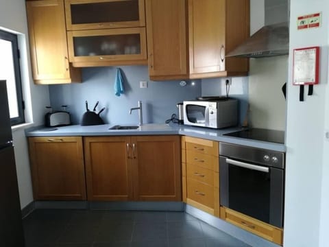 Apartment, 1 Bedroom, Balcony (2) | Private kitchen | Full-size fridge, microwave, stovetop, coffee/tea maker