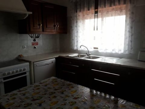 Apartment, 3 Bedrooms, Balcony | Private kitchen | Full-size fridge, microwave, oven, stovetop