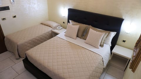 Triple Room | In-room safe, free WiFi, wheelchair access