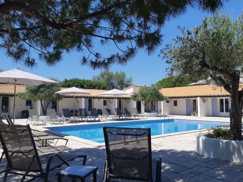 Outdoor pool, open 9:00 AM to 9:00 PM, sun loungers