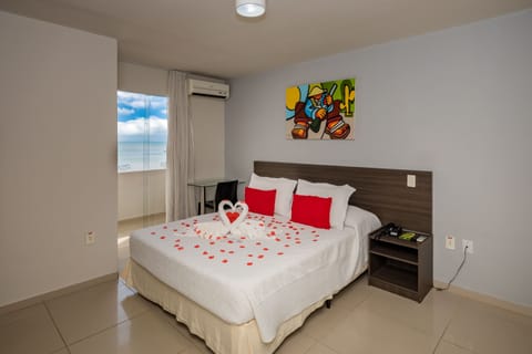 Deluxe Room, Sea View | Minibar, blackout drapes, free cribs/infant beds, free WiFi