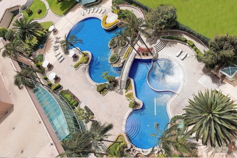 Outdoor pool, pool umbrellas, sun loungers