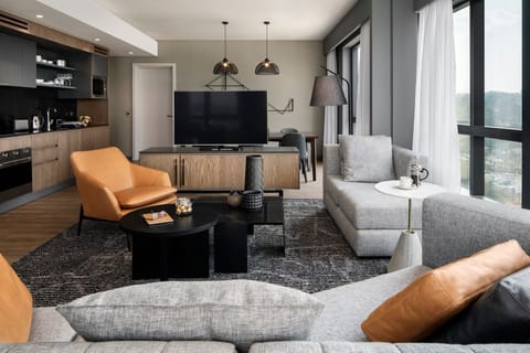 Apartment, 3 Bedrooms | Living room | Flat-screen TV