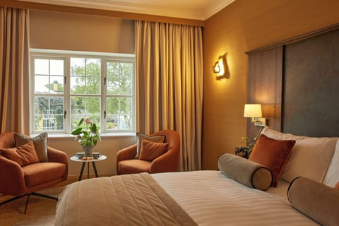 Superior Double Room, Garden View | In-room safe, desk, soundproofing, iron/ironing board