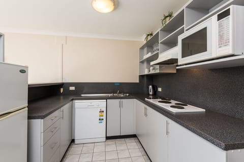 Standard Two Bedroom Apartment | Private kitchen | Coffee/tea maker, electric kettle