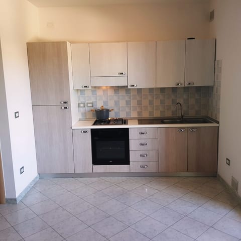 Apartment, 2 Bedrooms (Trilocale Savonarola) | Private kitchen | Full-size fridge, oven, stovetop, cookware/dishes/utensils