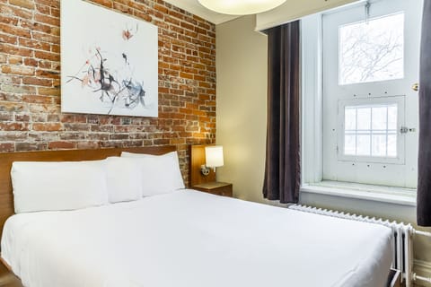 Economy Plus Room | Desk, blackout drapes, iron/ironing board, WiFi (free)