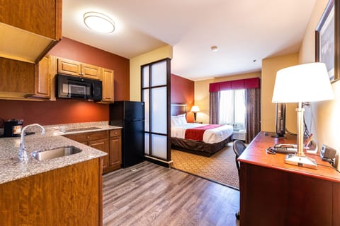 Suite, 1 King Bed, Accessible, Kitchenette (City/Lake Views) | Pillowtop beds, in-room safe, desk, laptop workspace