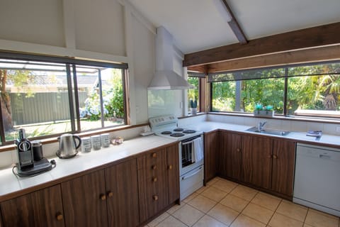 Three Bedroom House | Private kitchen | Fridge, microwave, stovetop, coffee/tea maker