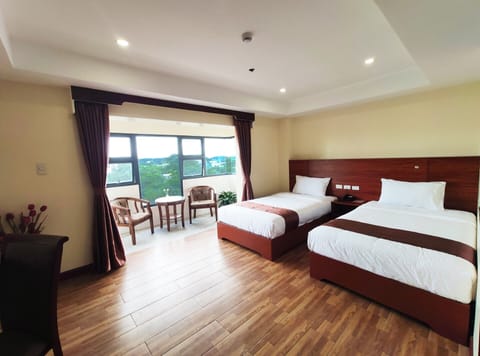 Basic Double or Twin Room, 2 Double Beds, Non Smoking, City View | In-room safe, desk, laptop workspace, blackout drapes