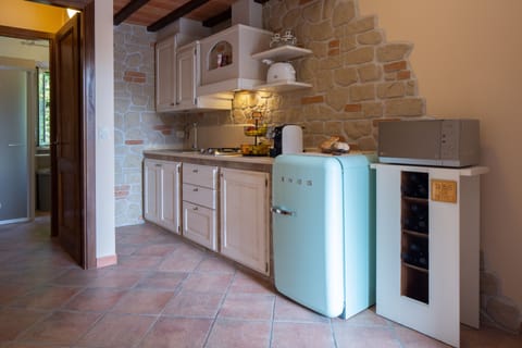 Apartment, Annex Building (Quercia 2) | Private kitchen | Full-size fridge, microwave, stovetop, espresso maker