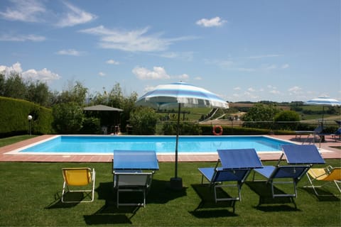 Seasonal outdoor pool, pool umbrellas, sun loungers