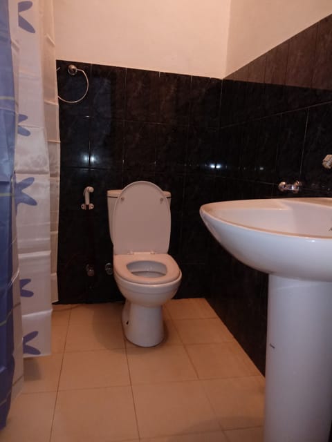 Basic Single Room (Room No 1) | Bathroom | Shower, rainfall showerhead, free toiletries, bidet