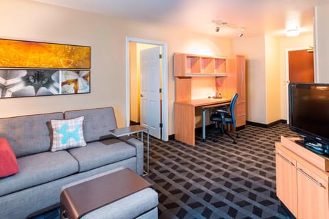 Suite, 1 Bedroom | Desk, laptop workspace, blackout drapes, iron/ironing board