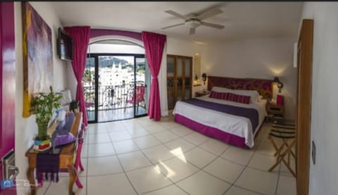 Junior Suite, 1 King Bed | In-room safe, iron/ironing board, free WiFi, bed sheets