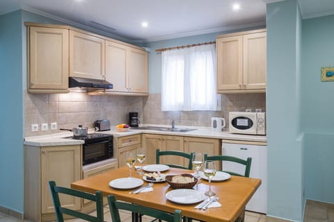 Three Bedroom Apartment | Private kitchen | Fridge, microwave, oven, stovetop